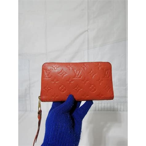 LOUIS VUITTON Monogram Empreinte Zippy Wallet Red .